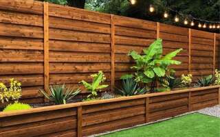 25 Beautiful and Fun Pallet Fence Ideas for a Stylish Outdoor Space